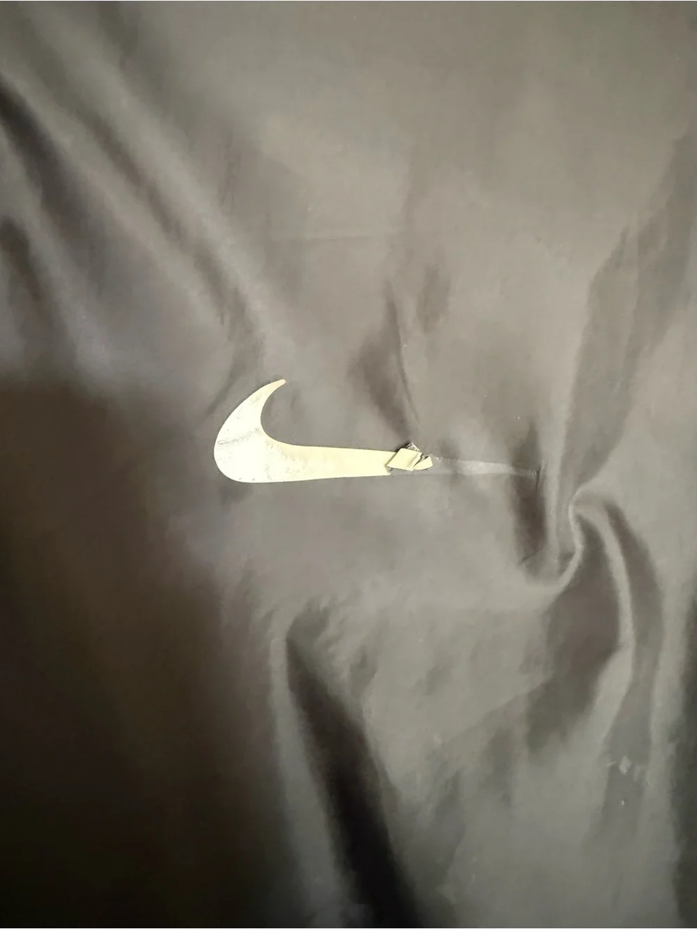 Nike Black Lightweight Jacket with Orange Paw Accent